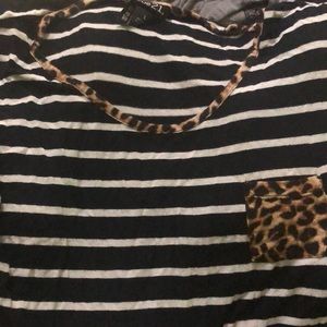 This shirt I cheetah striped size large and is from rue21